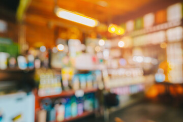 Blurry background. Blurry Interior of Cozy Artisan Shop with Colorful Display and Warm Atmosphere