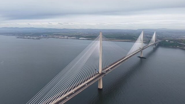 Aerial footage of Queensferry Crossing across Firth of Forth, Scotland, UK