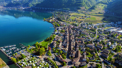 A panoramic aerial view around the old town of the city Villeneuve in Switzerland on a sunny spring noon