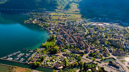 A panoramic aerial view around the old town of the city Villeneuve in Switzerland on a sunny spring noon
