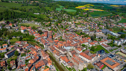 Panoramic aerial of the old town of the city Moudon in Switzerland on a sunny noon in summer