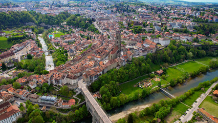 Panoramic aerial of the old town of the city Fribourg in Switzerland on a sunny noon in summer