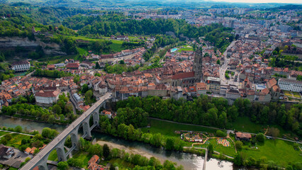 Panoramic aerial of the old town of the city Fribourg in Switzerland on a sunny noon in summer