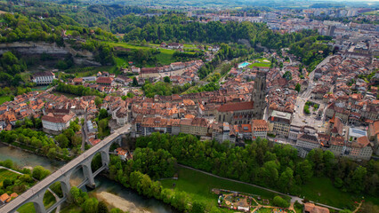 Panoramic aerial of the old town of the city Fribourg in Switzerland on a sunny noon in summer