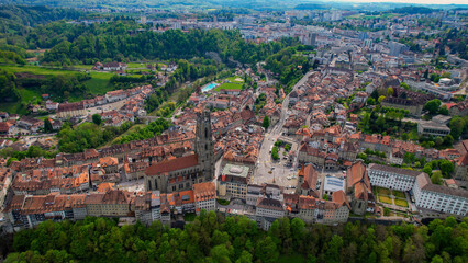 Panoramic aerial of the old town of the city Fribourg in Switzerland on a sunny noon in summer