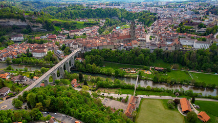 Panoramic aerial of the old town of the city Fribourg in Switzerland on a sunny noon in summer