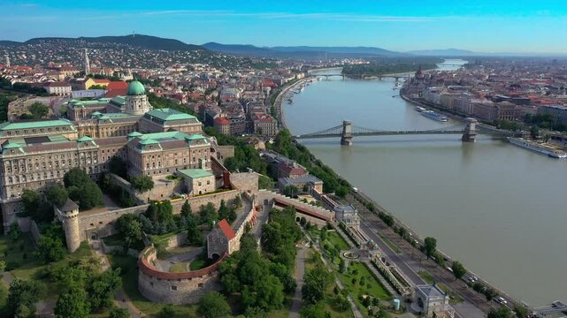 Aerial view of the panorama of Budapest, Hungary - 4K drone footage of Buda Castle, the Royal Palace and the Szechenyi Chain Bridge over the River Danube.