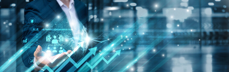 Businessman holding network administration icon and robust cybersecurity global network, system...