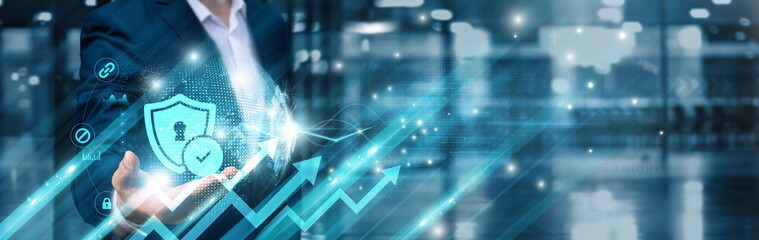 Businessman holding privacy protection icon and cybersecure intelligent global network, data...