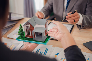 Real estate agent discusses and explains the steps of buying and selling a home. After that, they...