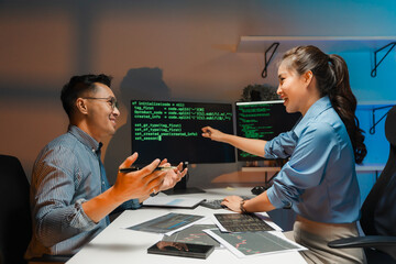 Software Developers Collaborating on Code