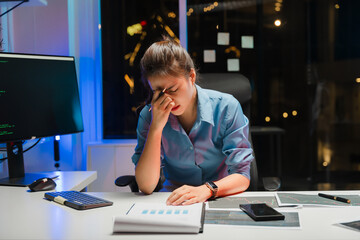 Stressed Woman Working Late at Night