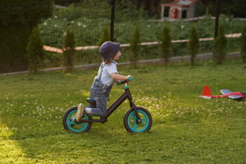 little boy riding a bike