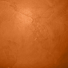 Orange plaster texture with smooth brush strokes, subtle cracks and warm lighting. Ideal for modern backgrounds, interior design mockups, posters, branding, rustic themes and digital artwork.