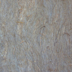 Natural handmade paper texture with visible fibers, organic straw inclusions, and earthy rustic tones. Ideal for eco designs, packaging, scrapbooking, backgrounds, and artisanal creative projects.