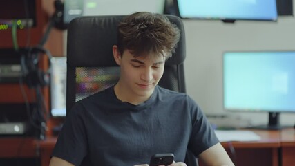 Young student learning computer science, coding, programming, IT classroom, system service administrator. Portrait of teenage boy. - Powered by Adobe