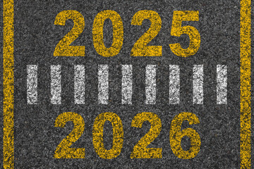 Change of year. Arrival of 2026 season. Number 2026 on asphalt. New year is approaching. Business...