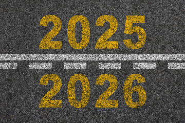 Change of year. Arrival of 2026 season. Number 2026 on asphalt. New year is approaching. Business...