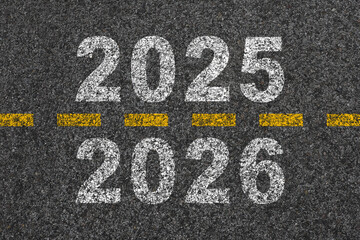 Change of year. Arrival of 2026 season. Number 2026 on asphalt. New year is approaching. Business...