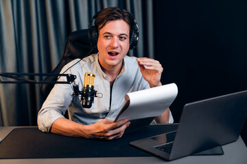 Host channel in smart broadcaster with talking show on live social media streaming with script note...