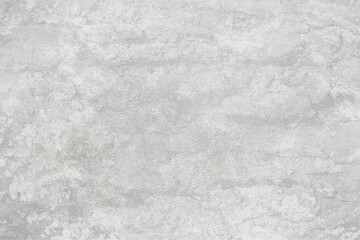 Texture of gray polished concrete background. Light plaster wallpaper with rough cement texture. Empty grunge wall concept or floor backdrop. Abstract surface mockup. Top view, close up, copy space