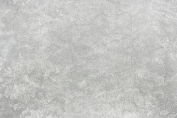 Texture of gray polished concrete background. Light plaster wallpaper with rough cement texture. Empty grunge wall concept or floor backdrop. Abstract surface mockup. Top view, close up, copy space