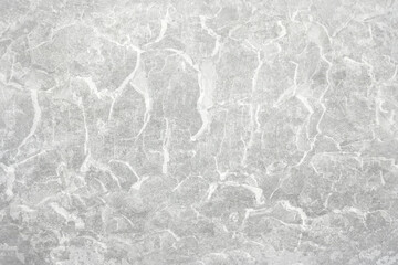 Texture of gray polished concrete background. Light plaster wallpaper with rough cement texture. Empty grunge wall concept or floor backdrop. Abstract surface mockup. Top view, close up, copy space