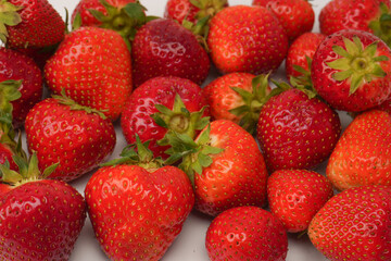 Fresh group of berries isolated on a white background.