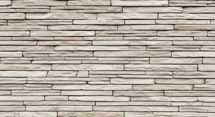 Obraz premium A gray stone wall provides a textured background