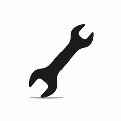 Fototapeta premium Black wrench icon for repair service. Simple wrench silhouette perfect for repair shop logo. This wrench image is ideal for construction and repair industry websites or applications.