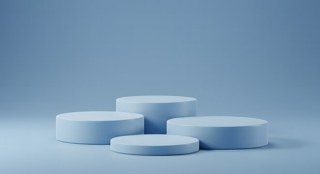 Four minimalist light blue cylindrical podiums arranged in a staggered formation on a light blue background