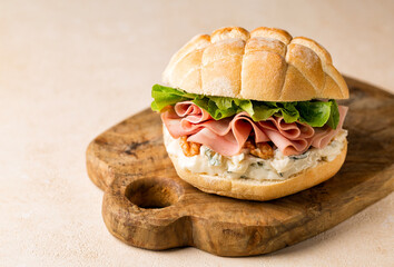 Italian sandwich with mortadella, gorgonzola cheese, walnuts, romaine lettuce, tartaruga bread....