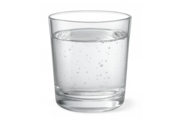 Transparent glass filled with sparkling water, showcasing effervescent bubbles against a clear background, embodying purity and refreshment