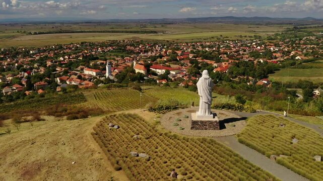 Giant statue of the Blessing Jesus Christ in Tarcal, Zemplen, Religious monument in Tokaj wine region, Hungary.