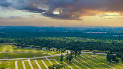 aerial shot of vast miles of lush green trees and homes at the Nashville Superspeedway in Lebanon...