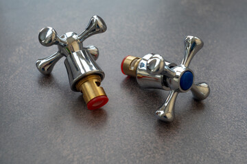 A crane box with a handwheel for the mixer.Replacement of bathroom faucet handles.