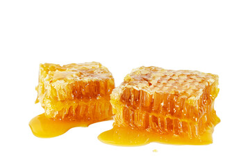 Honeycombs with flowing honey isolated on white background.