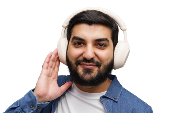 Man with headphones listening intently, ear cupped to hear better on a white background, smiling to camera