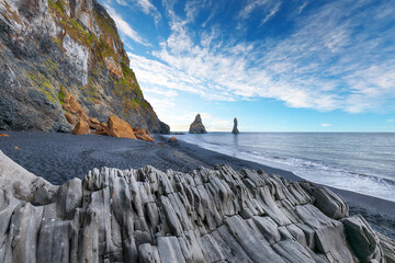Impressive landscape with basalt rock formations Troll Toes on Black beach Reynisfjara near the...