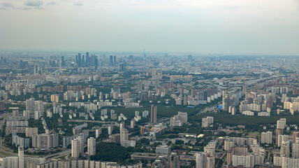 A breathtaking Aerial View showcasing Urban Development beautifully Surrounded by Lush Greenery