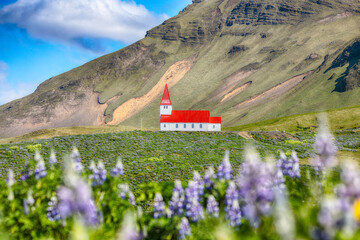 Impressive view of Vikurkirkja christian church in front of mouintain