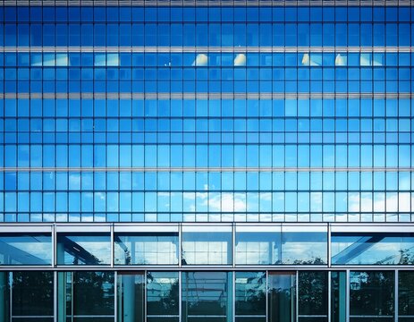 office windows facede blue glass and steel frame background texture front view