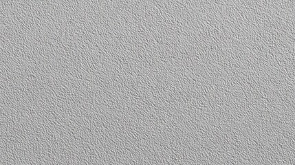 Gray canvas beckons a blank slate, revealing the subtle gradients of time-worn texture