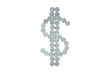 The Dollar symbol made out of quarter coins. White background