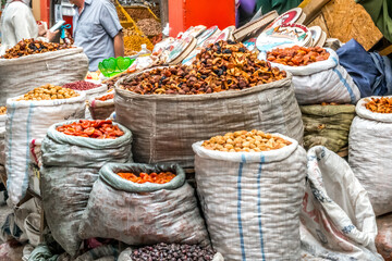 Close up view of bags of colorful different food grains in Osh bazaar in Bishkek, capital of...