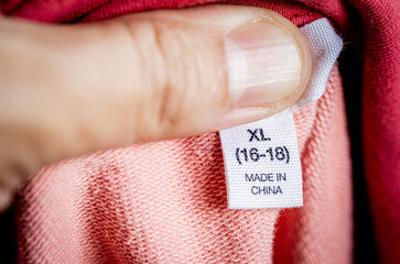 Macro shot of a clothing label reading 