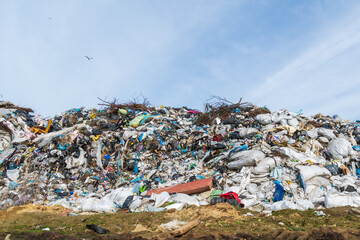 Landfill Showing Vast Quantities of Mixed Waste Under a Cloudy Sky