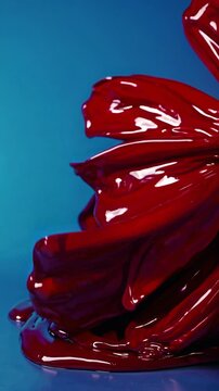  Fleur abstraite rouge brillante sur fond bleu