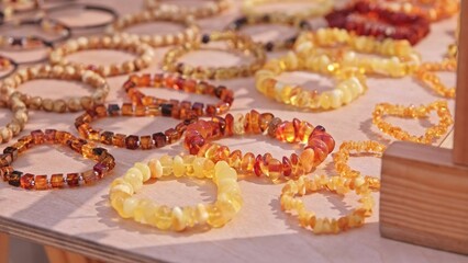 Valuable Jewelry Natural Amber Bracelet Sold on Outdoor Market Stand at Baltic Sea Resort in Poland