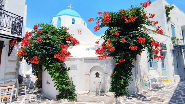 View of the Holy Trinity (Agia Triada) Church in Parikia, Paros island, Greece&mdash;a charming whitewashed Orthodox chapel crowned with a classic Cycladic blue dome.
